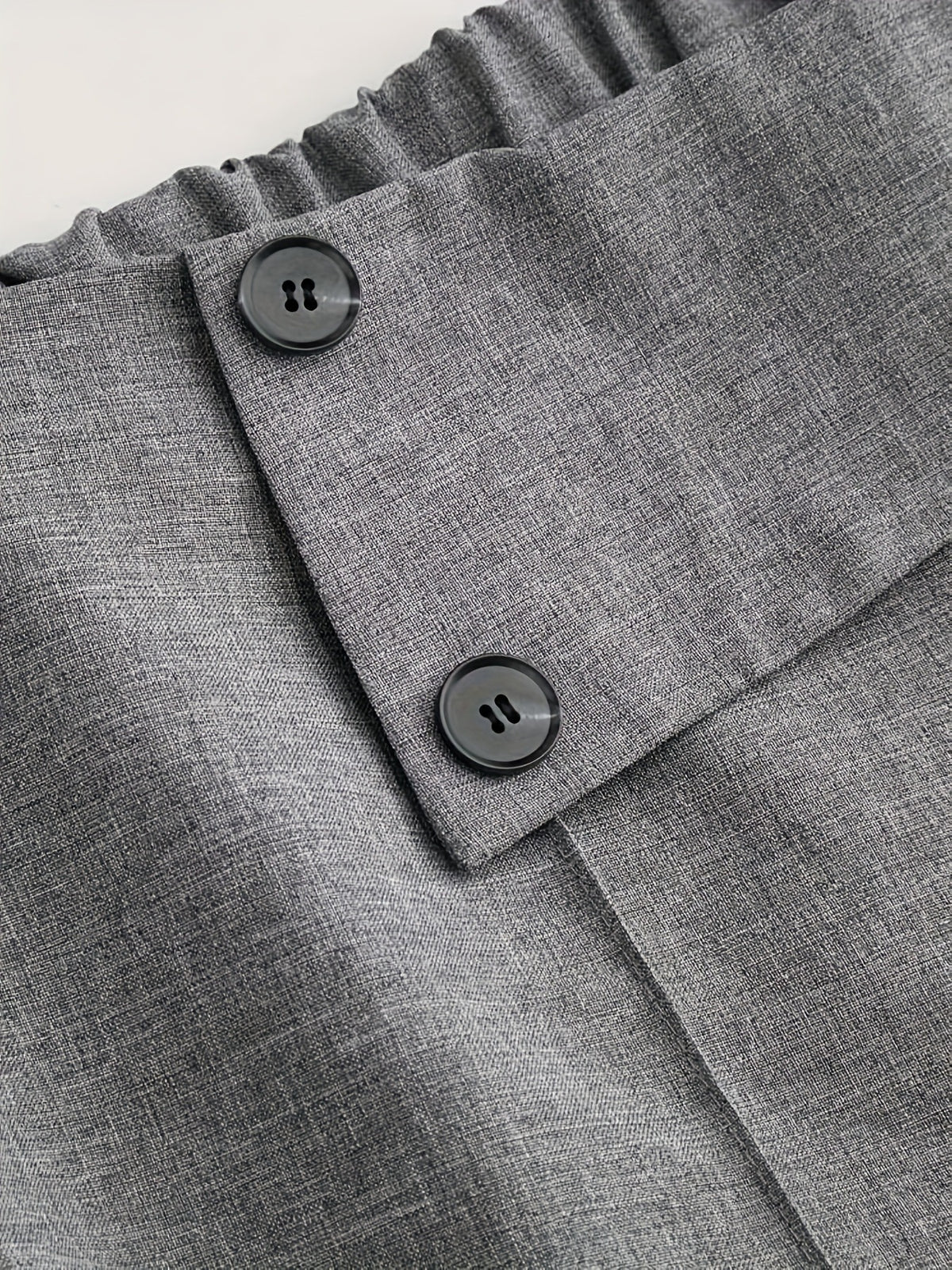 Chic And Sophisticated Grey Wide-leg Trousers With A Wrap-waist Design.