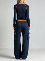 Casual Two-piece Set Featuring A Color-block Piped Stretch Knit Top And Pants.