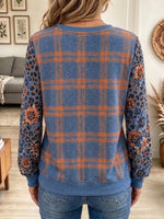 Long-sleeve Henley Top With A Mix Of Plaid, Floral, And Leopard Prints