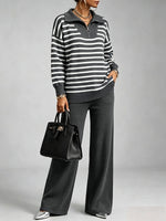 Cozy And Casual Two-piece Set Featuring A Striped Half-zip Knit Pullover And Solid-color Knit Trousers.