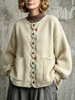 Loose-fit, Drop-shoulder Knit Cardigan Featuring A Wavy Placket, Decorative Colorful Buttons, And Large Patch Pockets