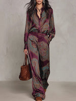 Two-piece Set Featuring A Satin Shirt And Trousers With A Vintage Paisley Print.