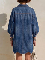 Knee-length Denim Dress Featuring A Lapel Collar, Large Gold Buttons, Lantern Sleeves, And A Wavy Hem